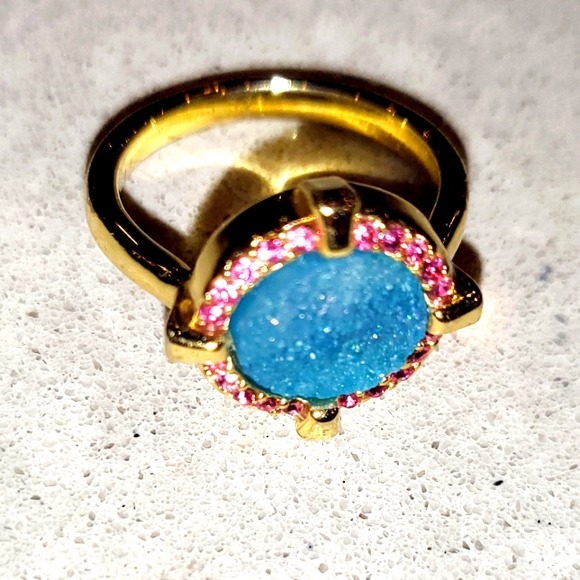 A gold-plated brass ring adorned with colorful semiprecious stones. - Picture 2 of 11